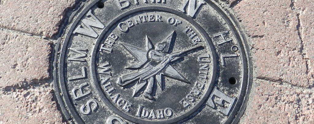 Center of the Universe manhole marker in Wallace, Idaho