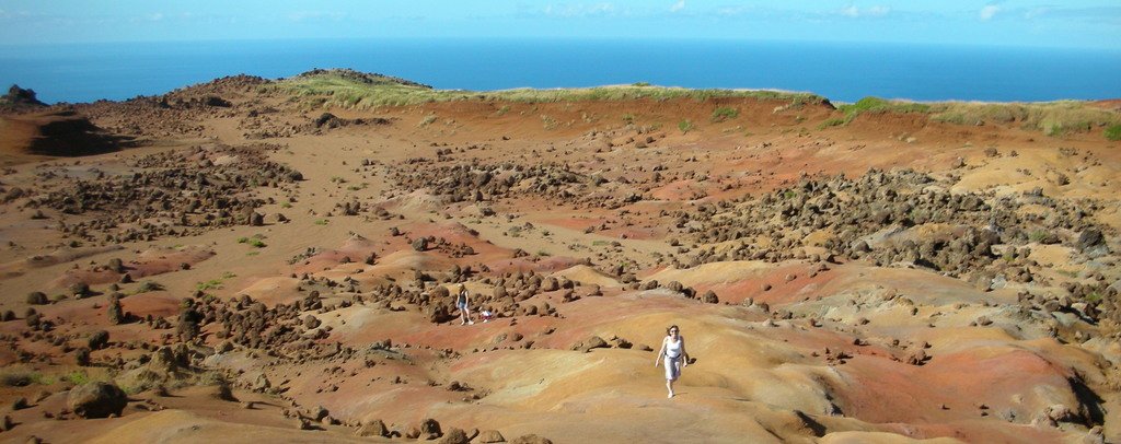 Red earth and scattered boulders stretch across the stark Keahiakawelo landscape on Lānaʻi.