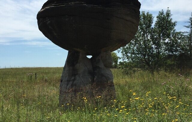 Large mushroom-shaped sandstone formation at Mushroom Rock State Park in Kansas