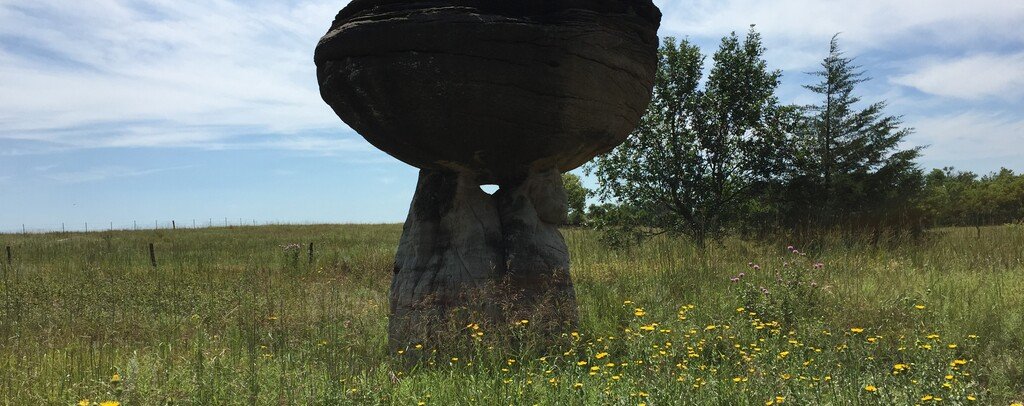Large mushroom-shaped sandstone formation at Mushroom Rock State Park in Kansas